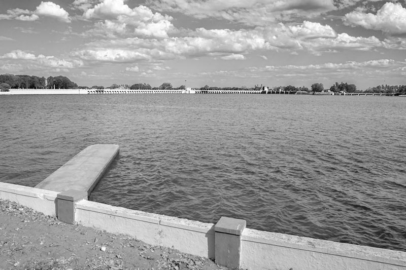 The beautiful Kaveri waterscape at the Grand Anicut Complex, bordered by the head regulators of Kaveri and Vennar distributaries as well as that of the Grand Anicut Canal in the background - in Thanjavur district, Tamil Nadu